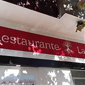 Diseño e impresión rótulos en vinilo adhesivo para el Restaurante la Raíz de Valladolid