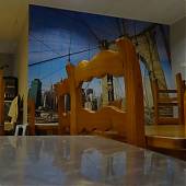 Impresión y colocación de un mural gigante en vinilo adhesivo para un restaurante